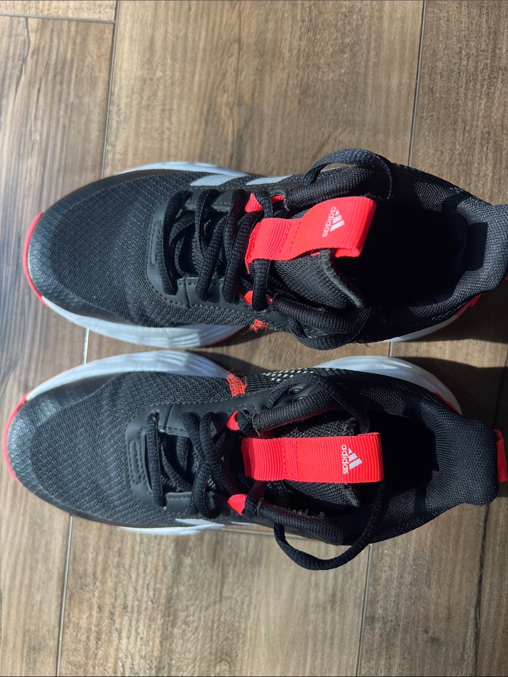 adidas Kids Black Sneakers with electric Red Accents